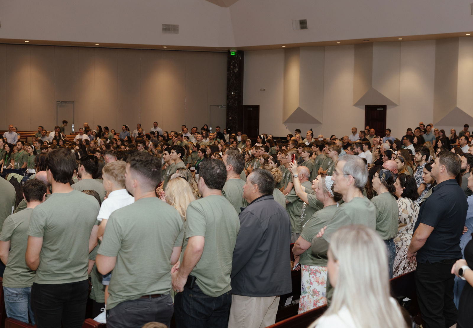 Families packed into the pews during worship in Phoenix
