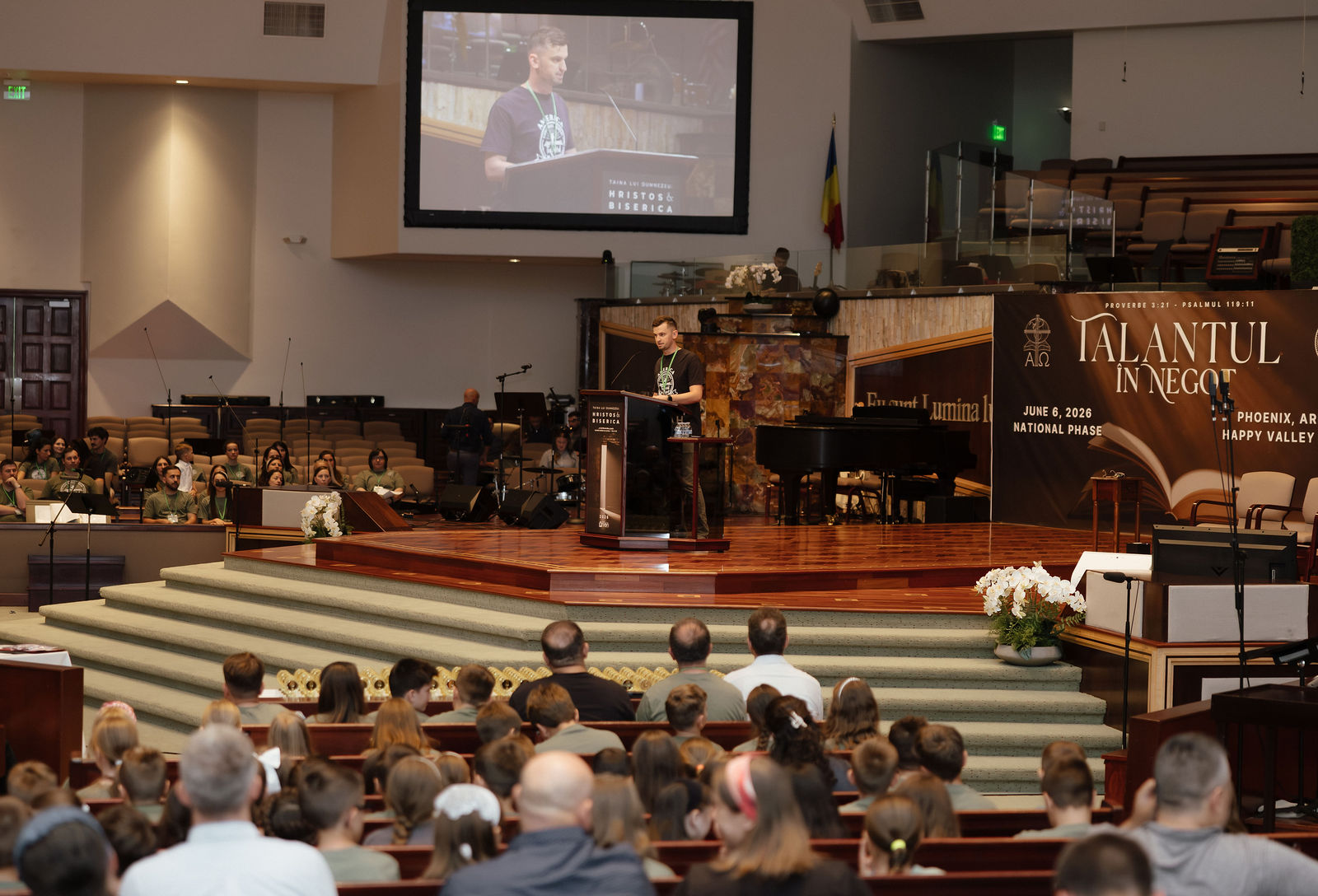 A contestant recites from the pulpit before the congregation
