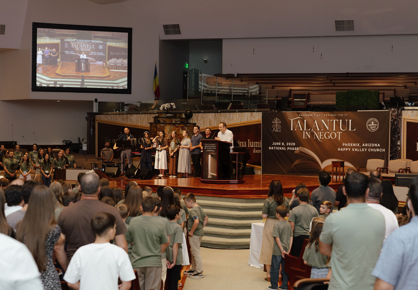 Children and youth facing the stage during the gathering